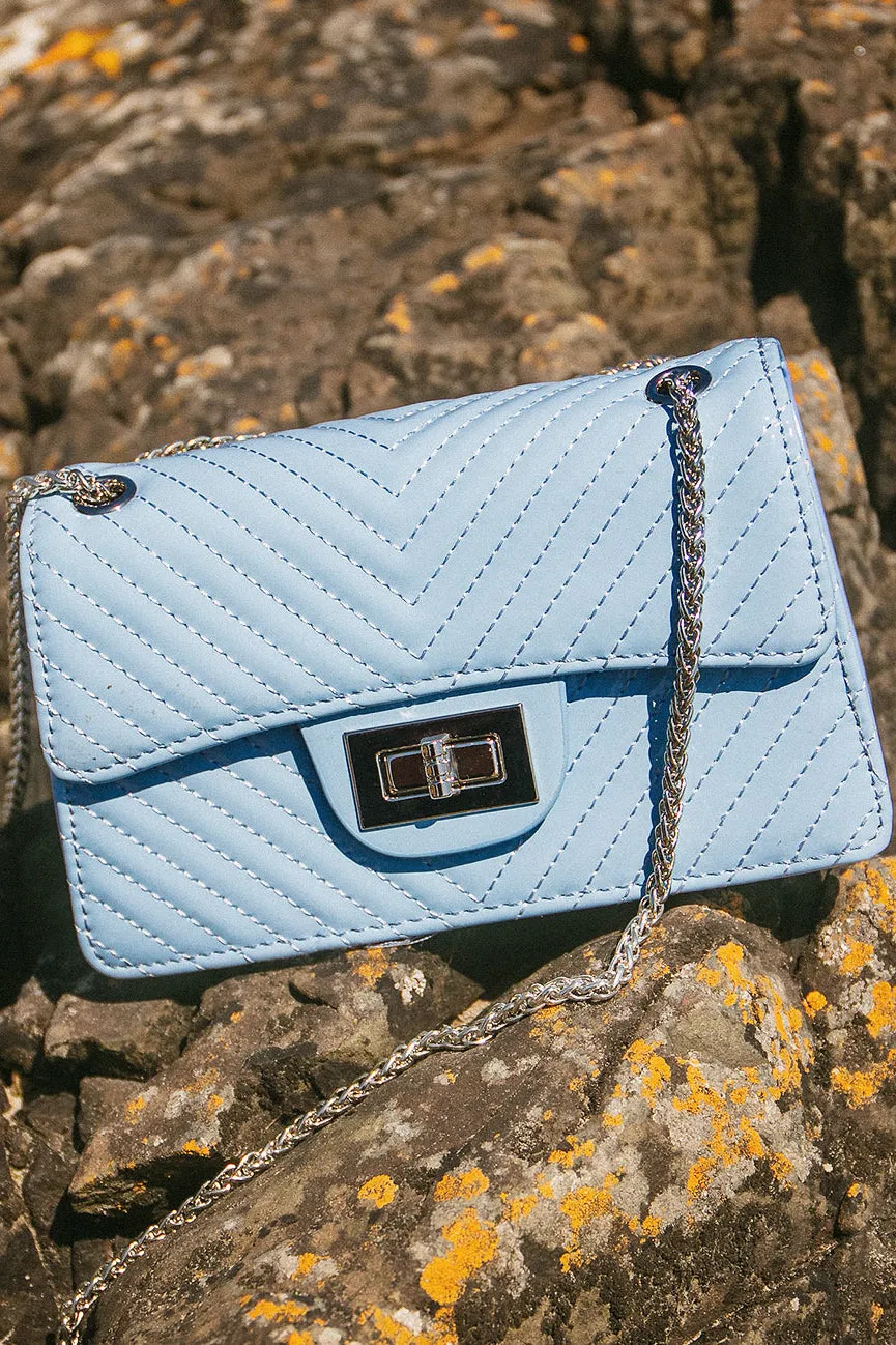 Kali Baby Blue Patent Chain Strap Bag