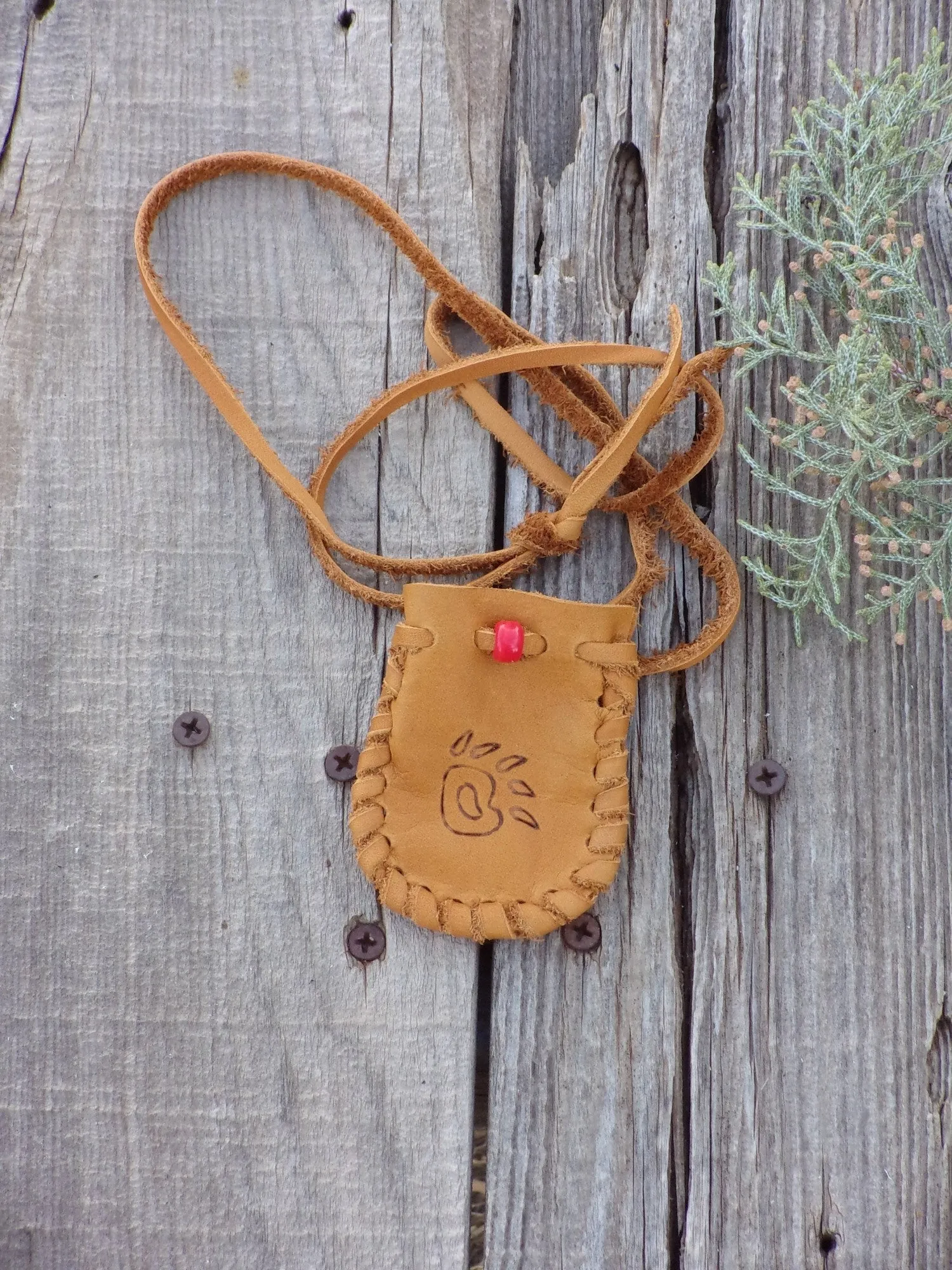 Leather medicine bag,  bear paw totem bag