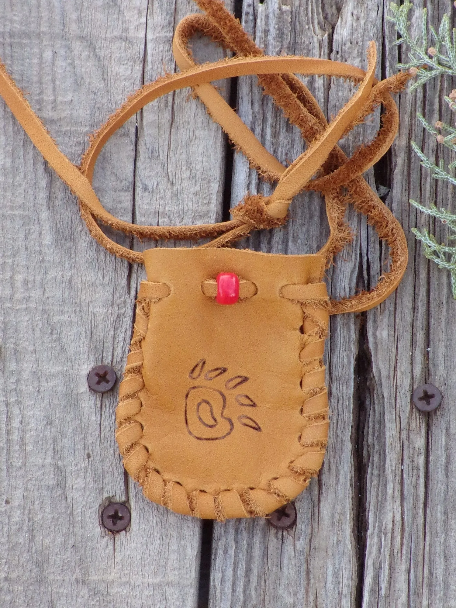 Leather medicine bag,  bear paw totem bag