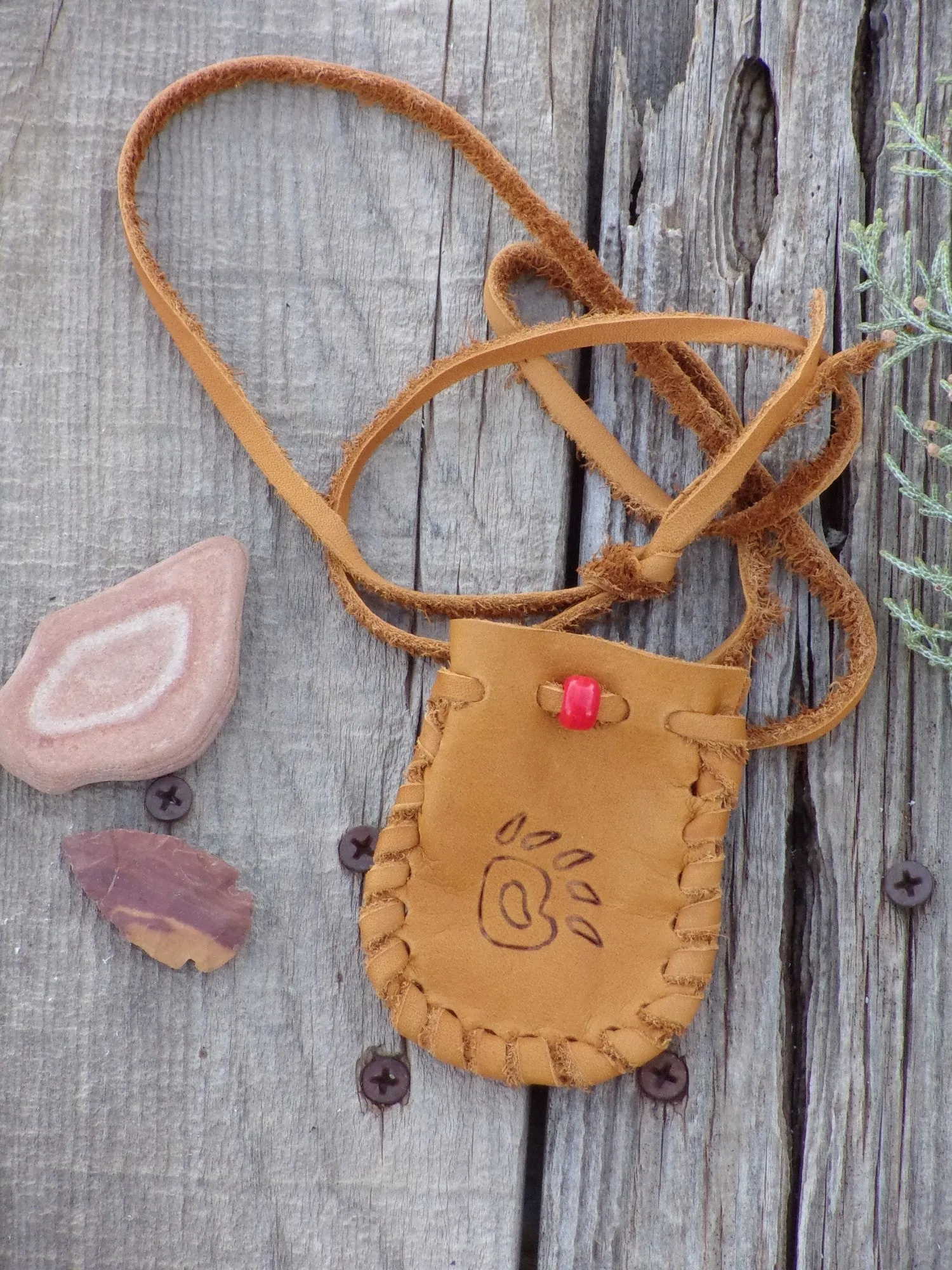 Leather medicine bag,  bear paw totem bag