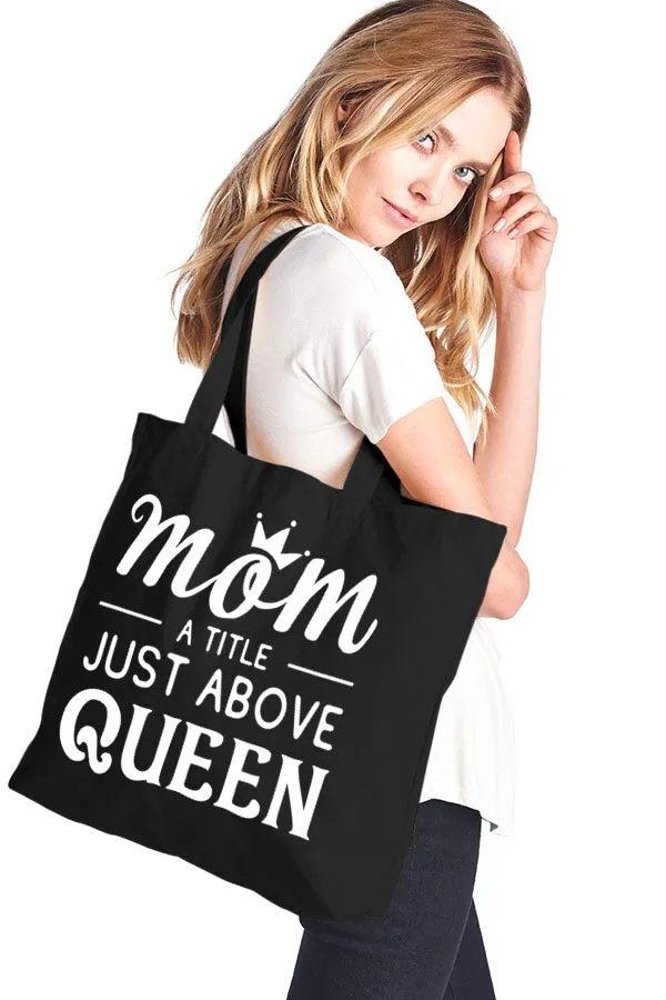 Mom a title just above queen cotton canvas tote bag