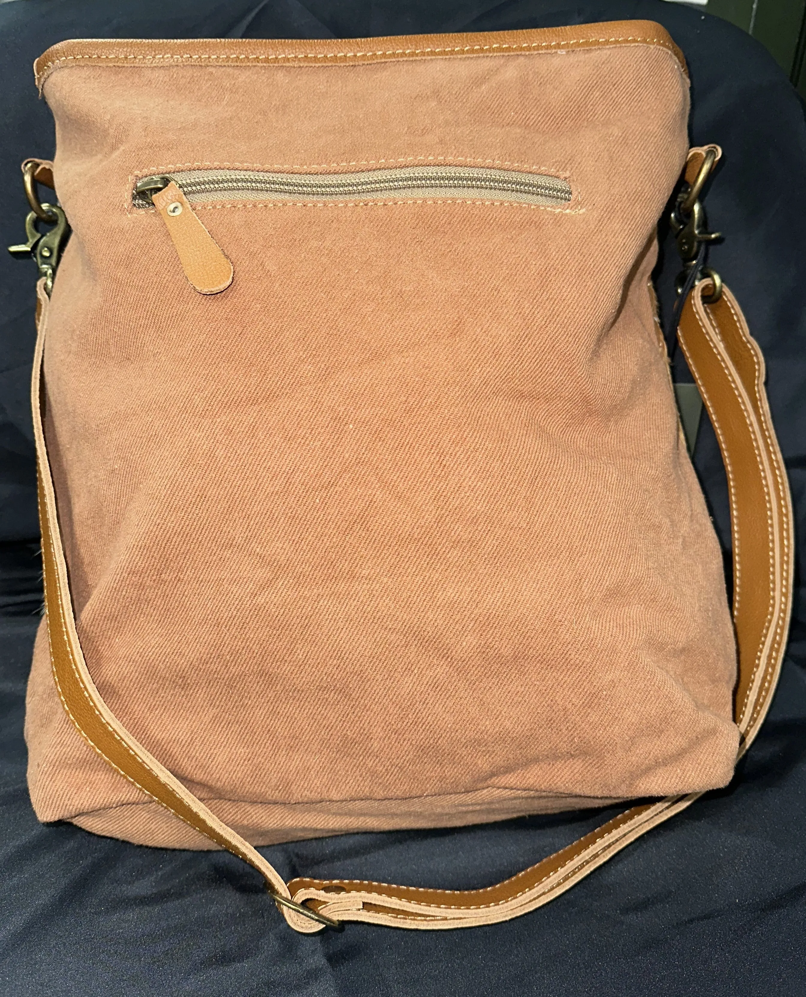 Myra Bag: "DAKOTA PLAINS CANVAS HAIR-ON BAG"